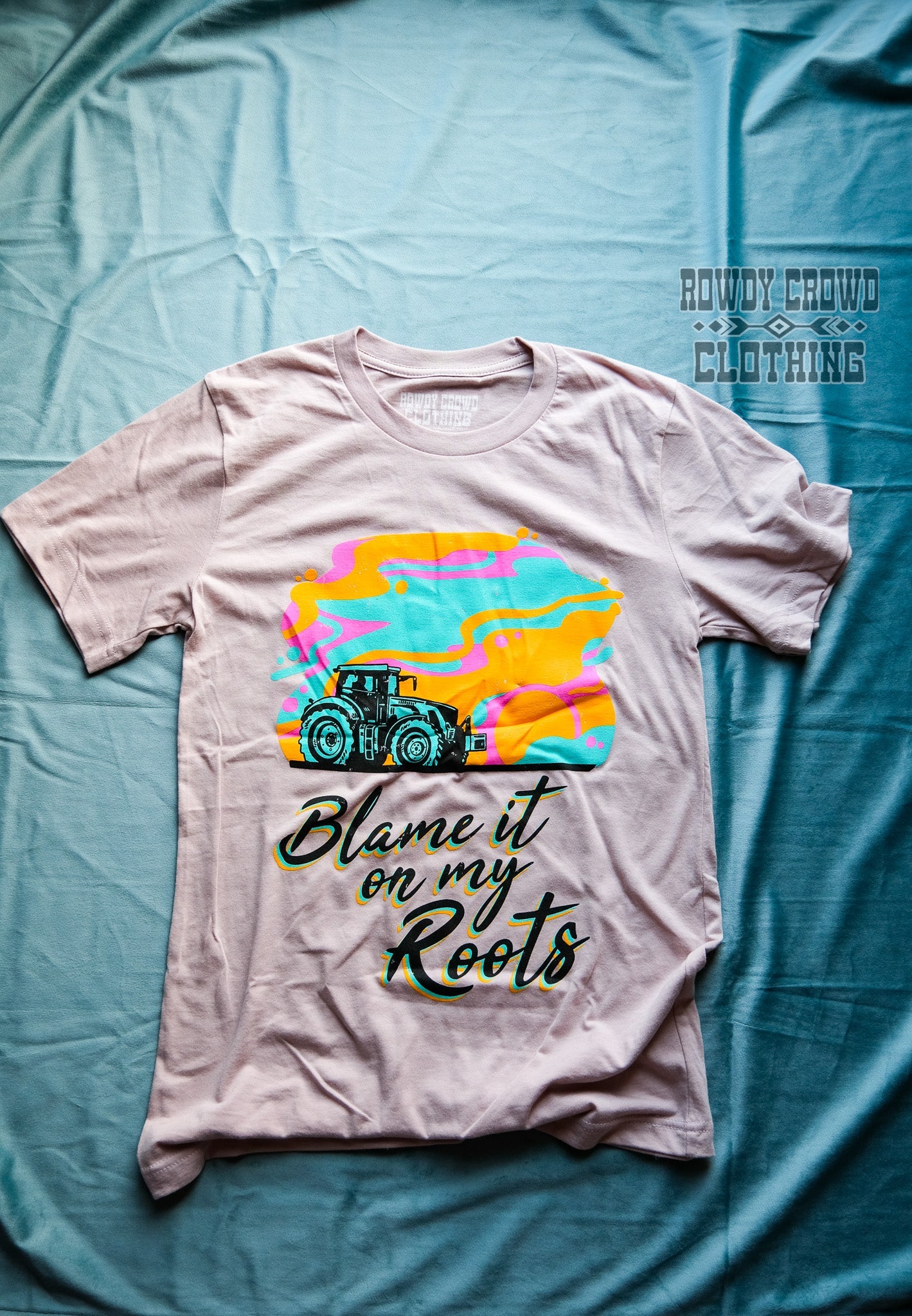 western apparel, western graphic tee, graphic western tees, wholesale clothing, western wholesale, women's western graphic tees, wholesale clothing and jewelry, western boutique clothing, western women's graphic tee, blame it on my roots tee, farming tee, women's farming tee, women's western tee, women's tractor tee