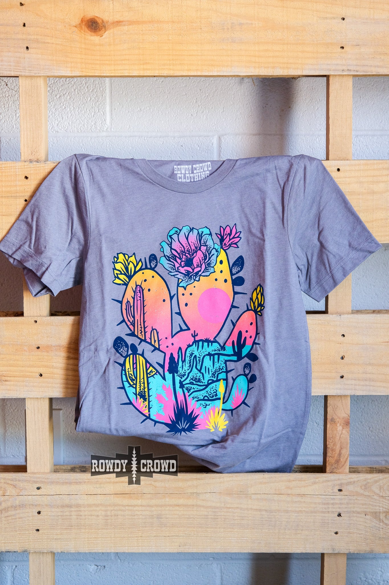 western apparel, western graphic tee, graphic western tees, wholesale clothing, western wholesale, women's western graphic tees, wholesale clothing and jewelry, western boutique clothing, western women's graphic tee, neon cactus graphic tee, cacti graphic tee, cactus, bright graphic tee, colorful graphic tee, neon graphic tee, colorful western graphic tee western cactus graphic tee